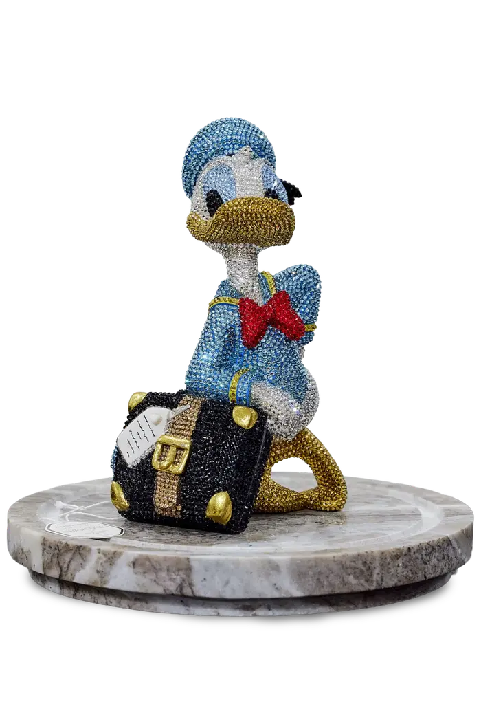 Mini Donald — a small crystal duck sculpture in genuine Swarovski&reg; crystals by Angela Gomes